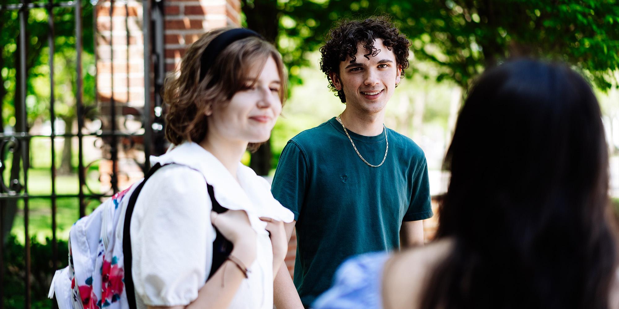 Students Standing Around Gate